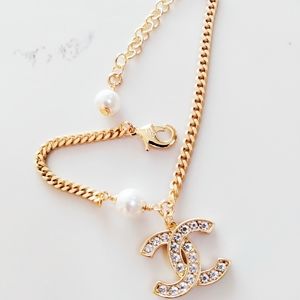 Chanel gold cc logo dangle bracelet